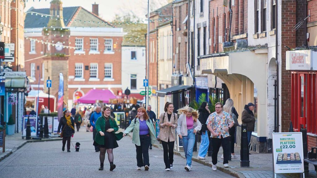 Students walking through Ormskirk town centre.